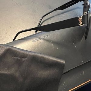 Black Metal YSL with gold accent glasses. No scratches
